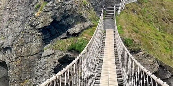 Carrick-a-Rede Rope Bridge spanning the Atlantic Ocean chasm