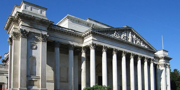 Fitzwilliam Museum neoclassical facade with Corinthian portico and courtyard glass roof