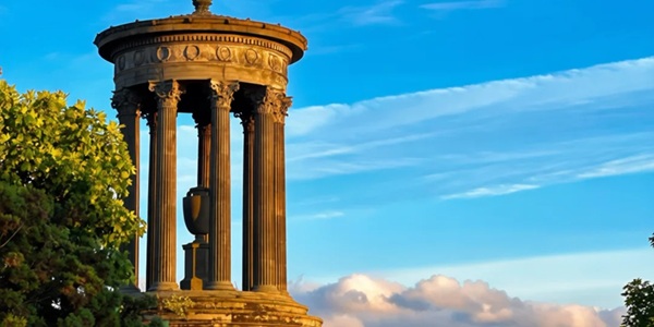 Calton Hill National Monument with Edinburgh Old Town panoramic skyline