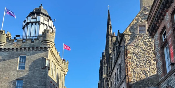 Panoramic view of the Royal Mile medieval street with St Giles' Cathedral Crown Spire