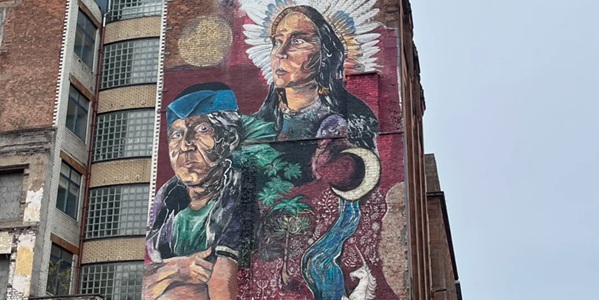Glasgow Mural Trail Smug hyperrealistic St Mungo mural and street art panorama
