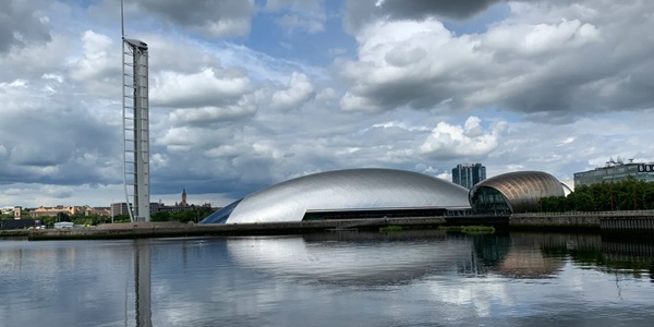 Panoramic view of Glasgow Science Centre titanium Science Mall and Glasgow Tower
