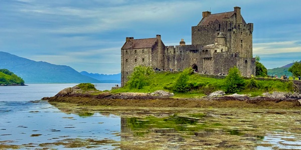 Eilean Donan Castle panoramic view at the confluence of three lochs