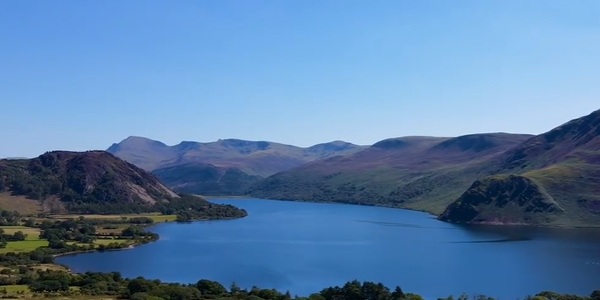 Panorama of Ennerdale Water and the rewilded valley, with Pillar Rock standing on the distant ridge