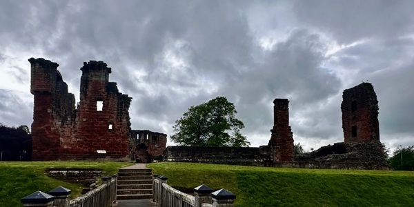 Penrith Castle ruins with Eden Valley countryside in the distance