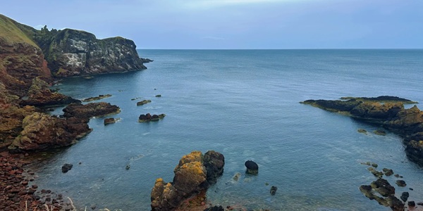 St Bees Head red sandstone sea cliffs with Irish Sea panorama