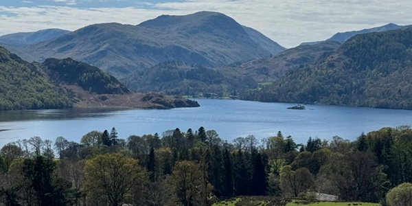 Ullswater Lake with steamer and Helvellyn mountain view