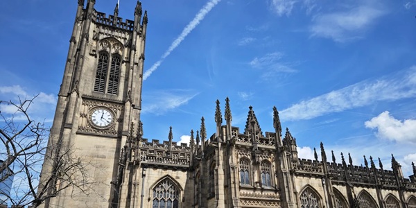 Panoramic View of Manchester Cathedral Interior Nave and Stained Glass