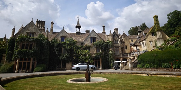 Cotswolds honey-coloured stone village with winding river